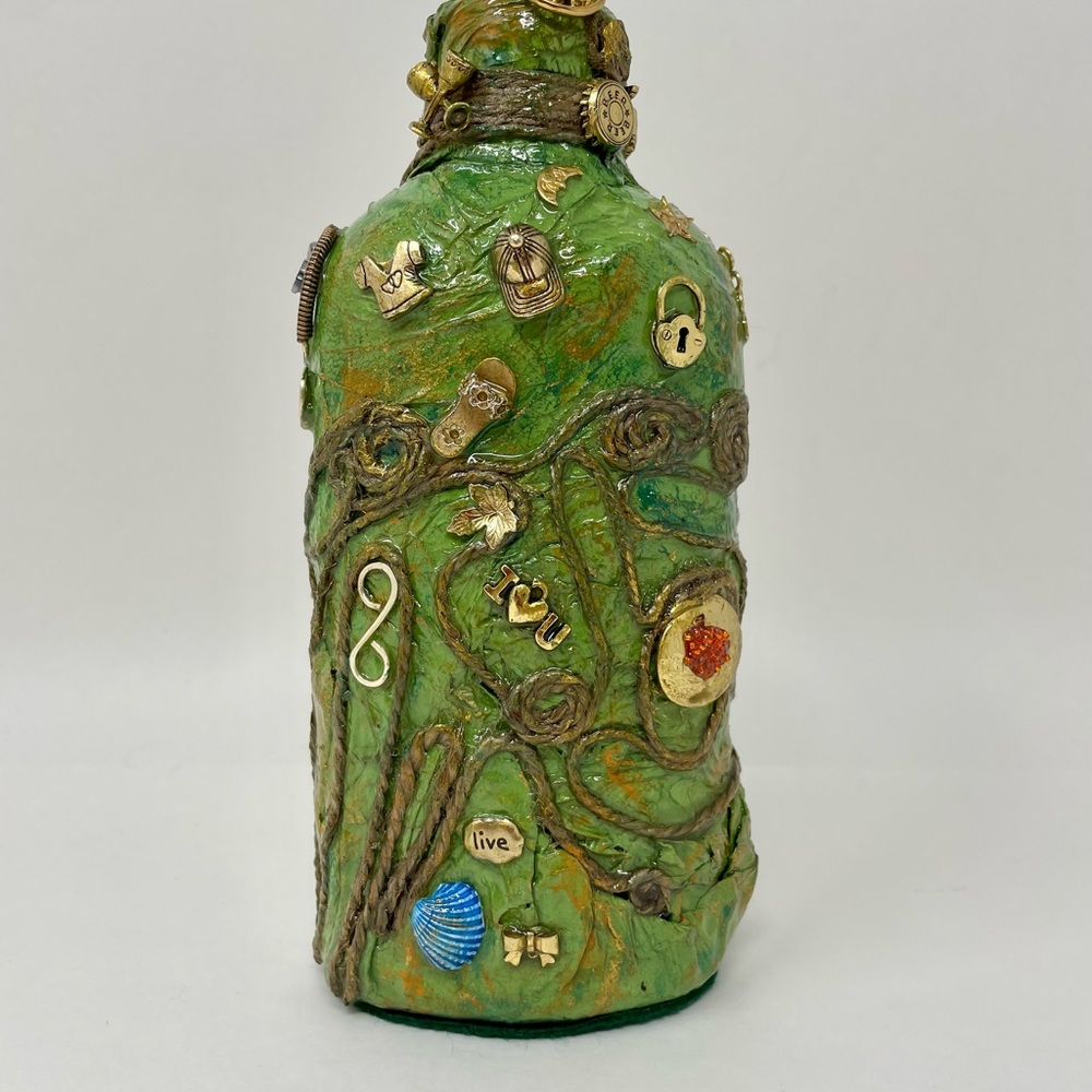 Light green artwork bottle.